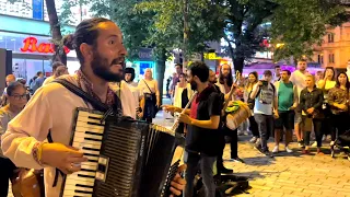 Colombian band is performing a traditional Ukrainian song "TY ZH MENE PIDMANULA" in Prague