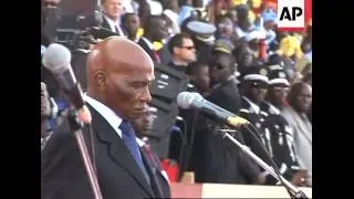 Senegal's president is inaugurated, as dictators, statesmen look on