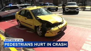 2 pedestrians seriously hurt after driver runs red light, hits them in crosswalk, Chicago police say