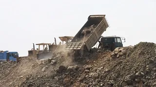 Skills Truck Driver High Level Unloading Experience Large Landfill Bulldozer KOMATSU Pushing Rock