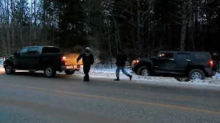 Ford F-150 Pulls HUMMER from Snow Ditch