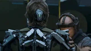 Elysium Agent Kruger Suiting up exoskeleton scene