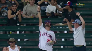 Fan makes a SPECTACULAR CATCH while HOLDING NACHOS!