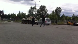 T-55 crushes car for charity