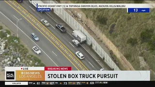 Stolen box truck squeezes along shoulder of PCH in police pursuit