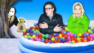 LAST TO LEAVE Giant Ball Pit in Snow Wins $10,000! (Game Master Hidden Clues & Rebecca Zamolo Twin)