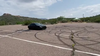 2017 Mercedes Benz C63 doing donuts.