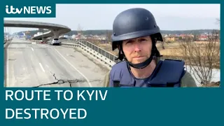 Hundreds of shells fall on Kyiv suburb as Ukrainians blow up bridge to halt Russian tanks | ITV News