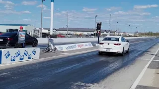 mazda 3 turbo 2021 full stock acceleration drag 14 mile vs VW GLI Napierville Dragway