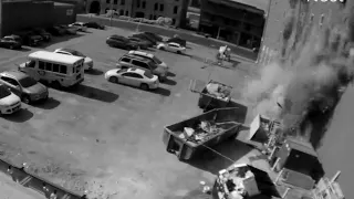 Surveillance video shows moment of Iowa apartment building collapse