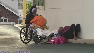 Sidewalk squatters move up the road after tarp encampment torn down