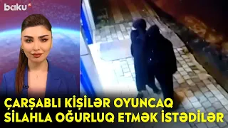 Çarşablı kişilər oyuncaq silahla oğurluq etmək istədilər - Maraqlı Anlar