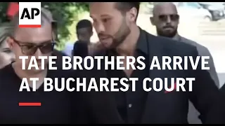 Tate brothers arrive at Bucharest court
