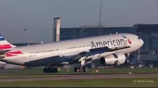 Airbus A330-243  Graceful landing with some Wing Condensation.