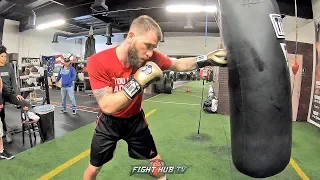 CALEB PLANT DRILLS HEAVY BAG WITH QUICK COMBINATIONS & SHOWS OFF FOOTWORK DURING HEAVY BAG WORKOUT
