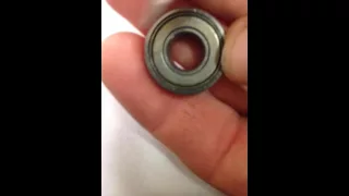 Model engine bearing shield removal