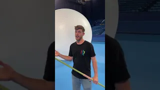 Man with a javlin Vs 10 Mega Balloon