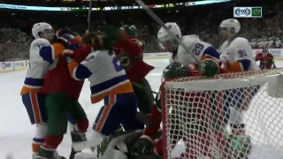 Dubnyk starts huge line brawl with slash