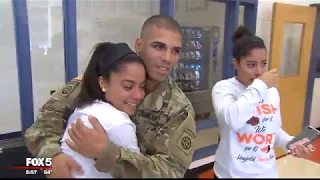 Soldier returns from Iraq to surprise twin sisters at Virginia high school