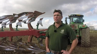 Kverneland PW 100 12 furrow plough in action at North Farm Horton, UK.