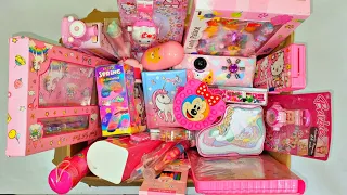 Box full of pink stationery - password pencil box, raabit pen, pencil sharpner, projector watch etc