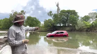 A car flooded at Cahill’s Crossing, Northern Territory, Australia.