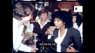 1970s, 1980s USA, Wealthy People Drinking Champagne at Bar