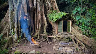 Build a shelter under a giant tree, eat mountain snails, and spend the night in the rainforest.