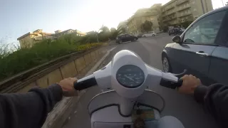 Riding to School with my Vespa PX