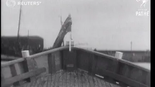 Fishing boat launched off pier in Scotland (1935)