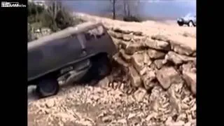 Russian truck makes it up near-vertical rock mound