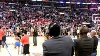 Clippers fan scores from halfcourt during time out and wins a car