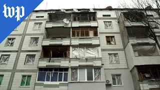 Fighting in Ukraine rocks a building, leaving homes destroyed and residents abandoned