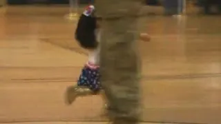 Girl Dashes for Soldier Dad at Reunion