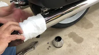 Repacking motorcycle mufflers