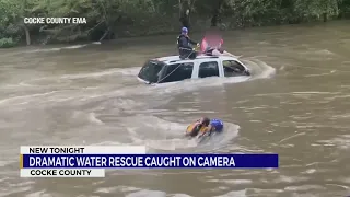 CAUGHT ON VIDEO: Family rescued in flash flood