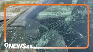 Travelers return to find damaged vehicles after hail storm pounds Denver airport