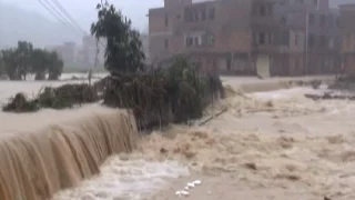 Firefighters Evacuate Residents from Flooded East China's Village