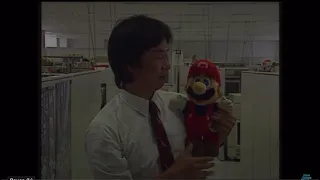 Shigeru Miyamoto pats Mario on the head :)