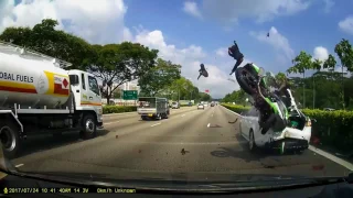 Speeding motorcycle smash into stationary car; biker flung into the air