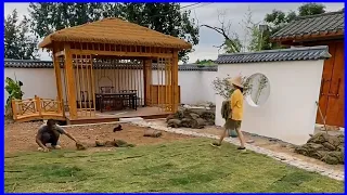 Skilled workers build a beautiful garden, wooden house, and aquarium