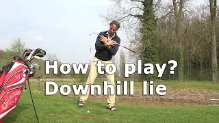 How to play a golfball in a downhill lie?