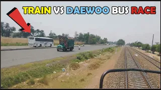 Fastest Train Jinnah Express 32dn Vs Daewoo bus road vehicles near Sahiwal amazing train vs bus race