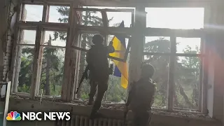 Watch: Ukrainian soldiers plant flag in previously Russian-occupied territory