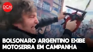 Milei, o “Bolsonaro argentino” exibe motosserra em comício