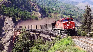 Unbelievable Coal Dust Blown OFF Train Over Cisco Bridge, And 2 People Seen Train Hopping Riding Car