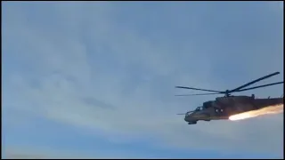 Ukraine war, Ukrainian MI-8 and MI-24 launching rockets at Russian positions while deploying flares