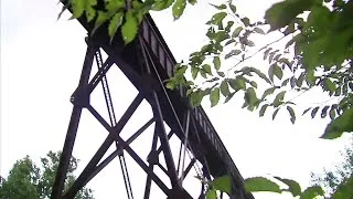 Video: brush with death on railroad bridge