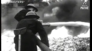 Fire fighters demonstrate new techniques (1950)