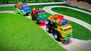 mobil truk gandeng konvoi angkut mobil miniatur, ada mobil polisi, ambulan, loader